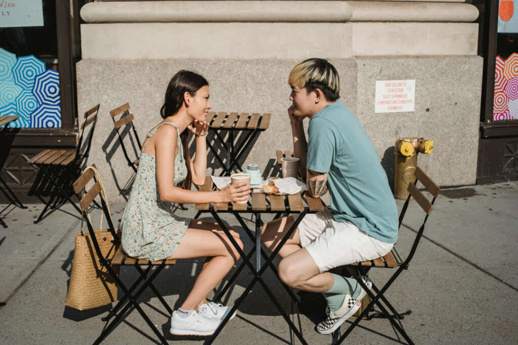 a couple eating at a restaurant