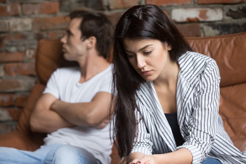 woman sitting with man breakup