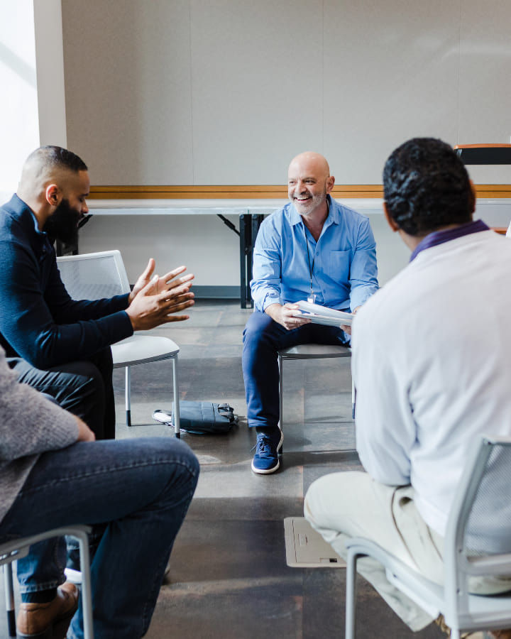 group of men talking