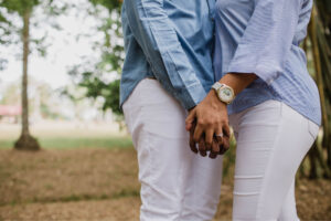 a married couple holding hands